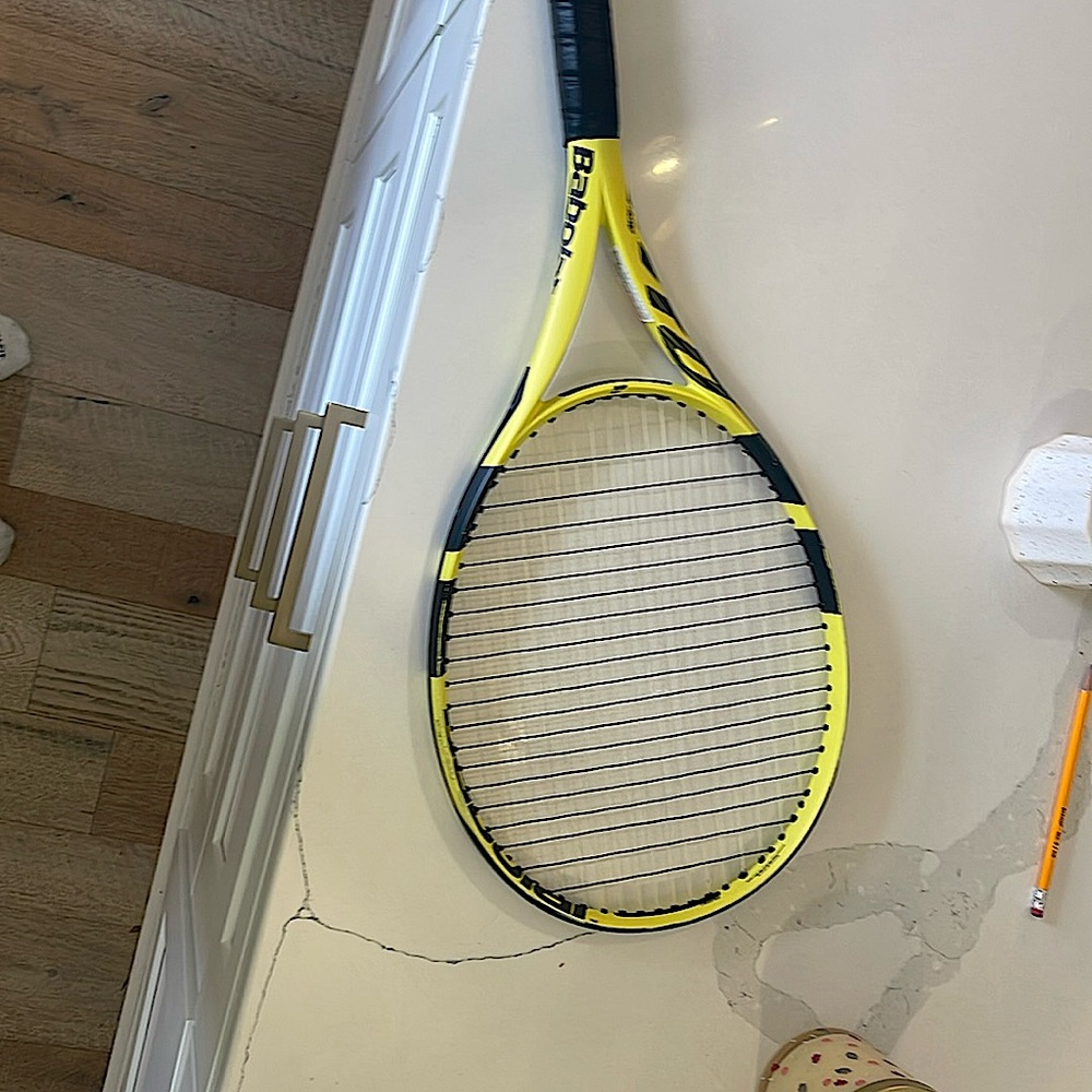 Babolat Pure Aero 27in. Tennis Racket, used but still works like new. Pre strung